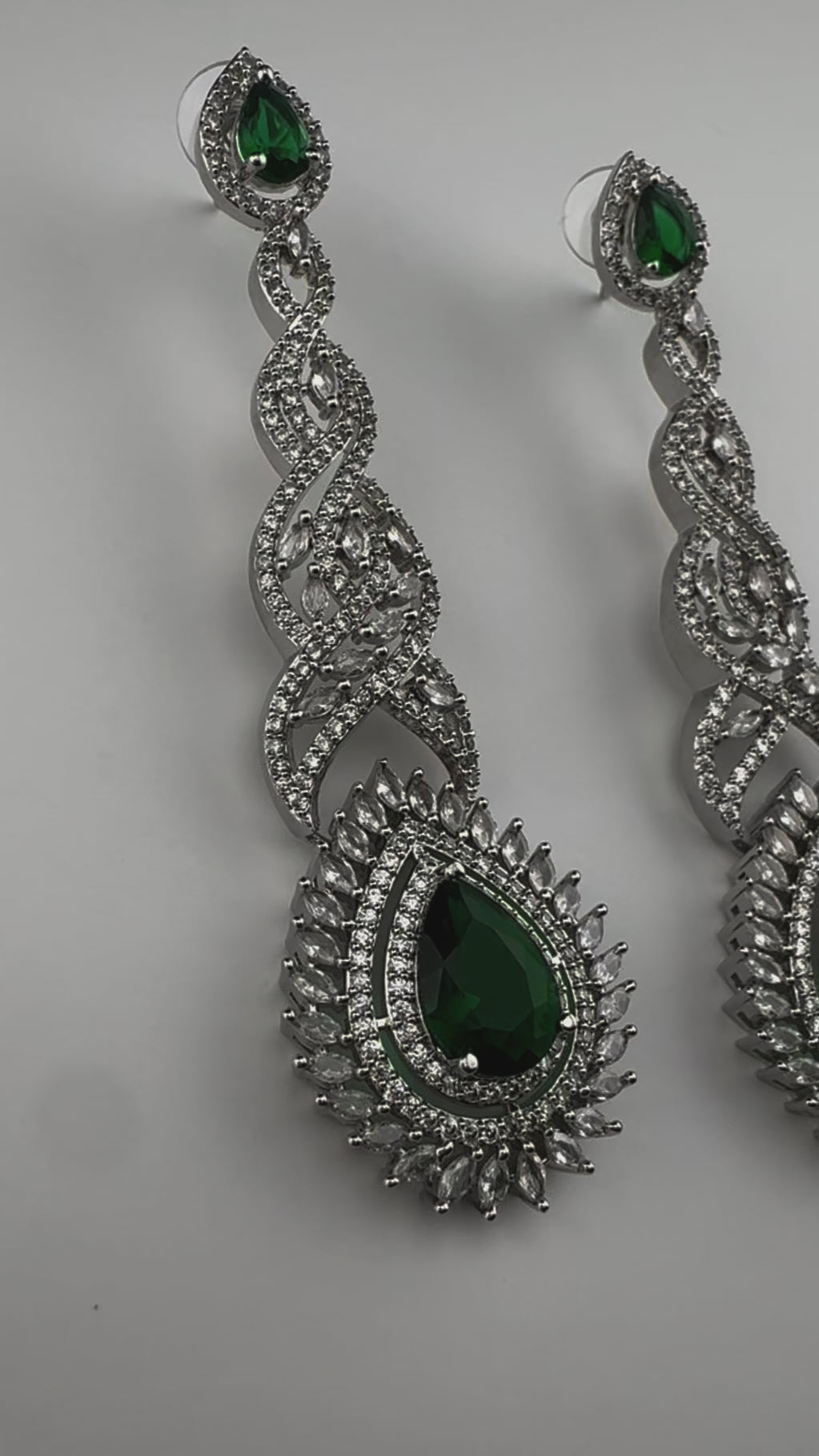 Premium Cubic Zirconia and Crystal stone in silver color is designer Inspired Statement Long earrings