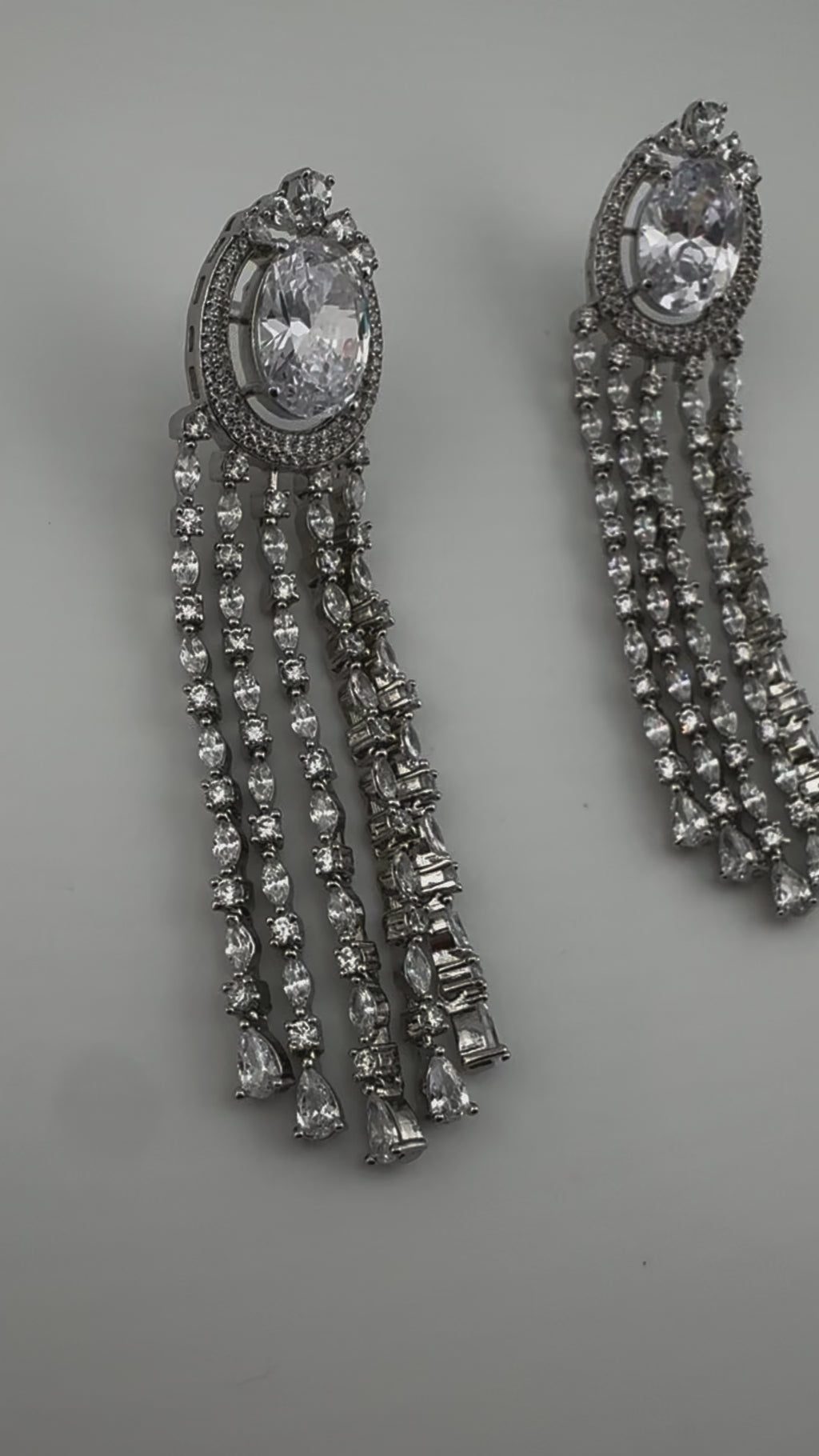 Premium silver color Cubic Zirconia long tassel earrings, high shine