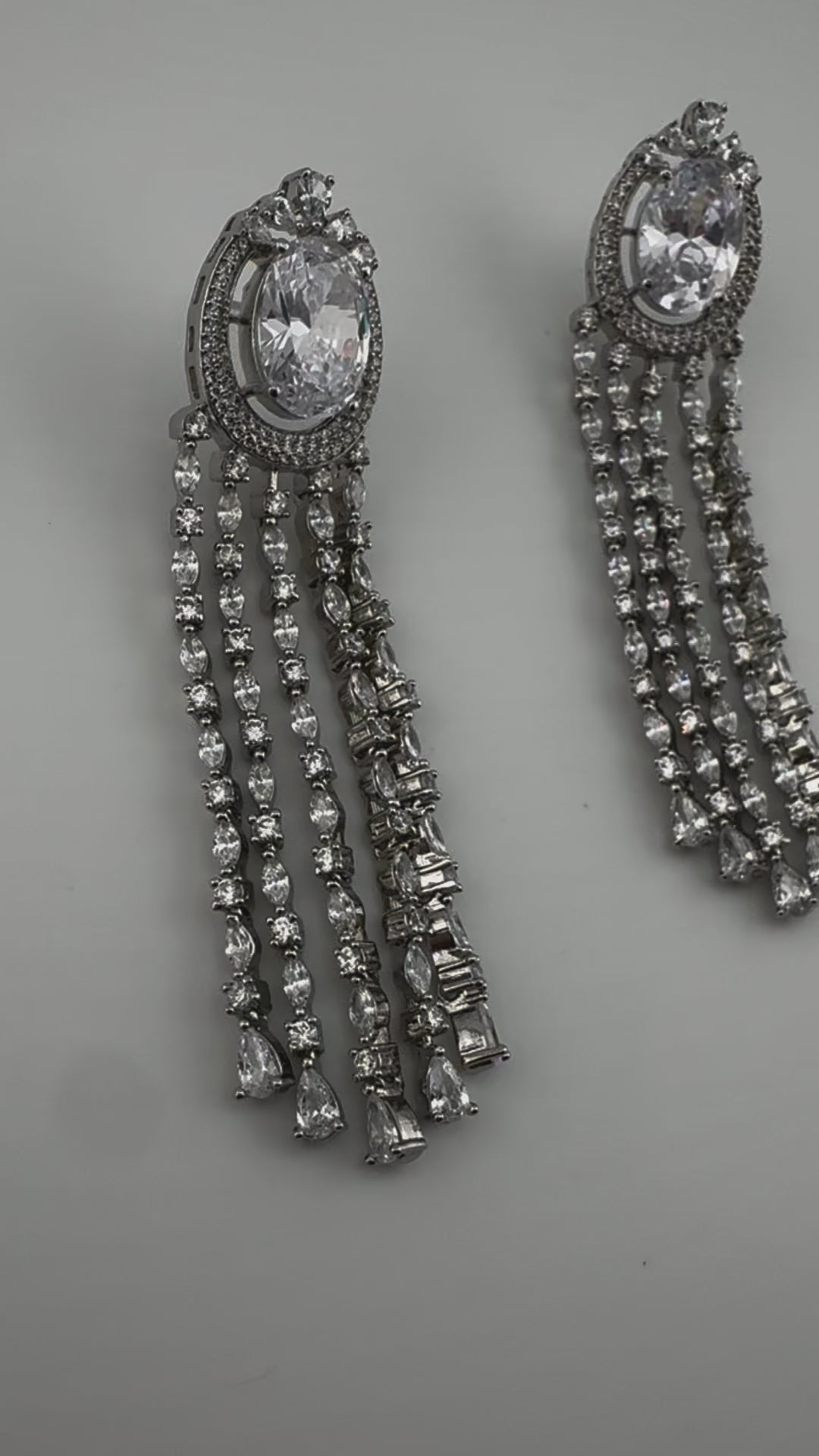 Premium silver color Cubic Zirconia long tassel earrings, high shine