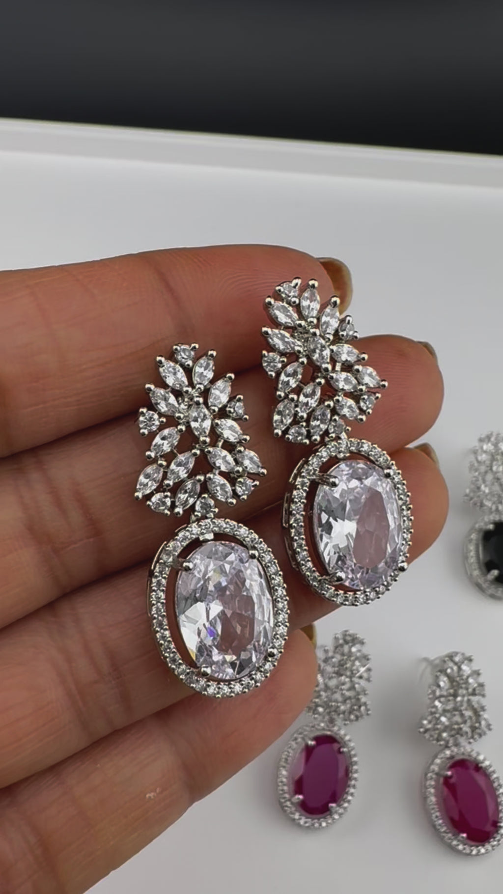 Premium Cubic Zirconia and Crystal stones in silver color earrings